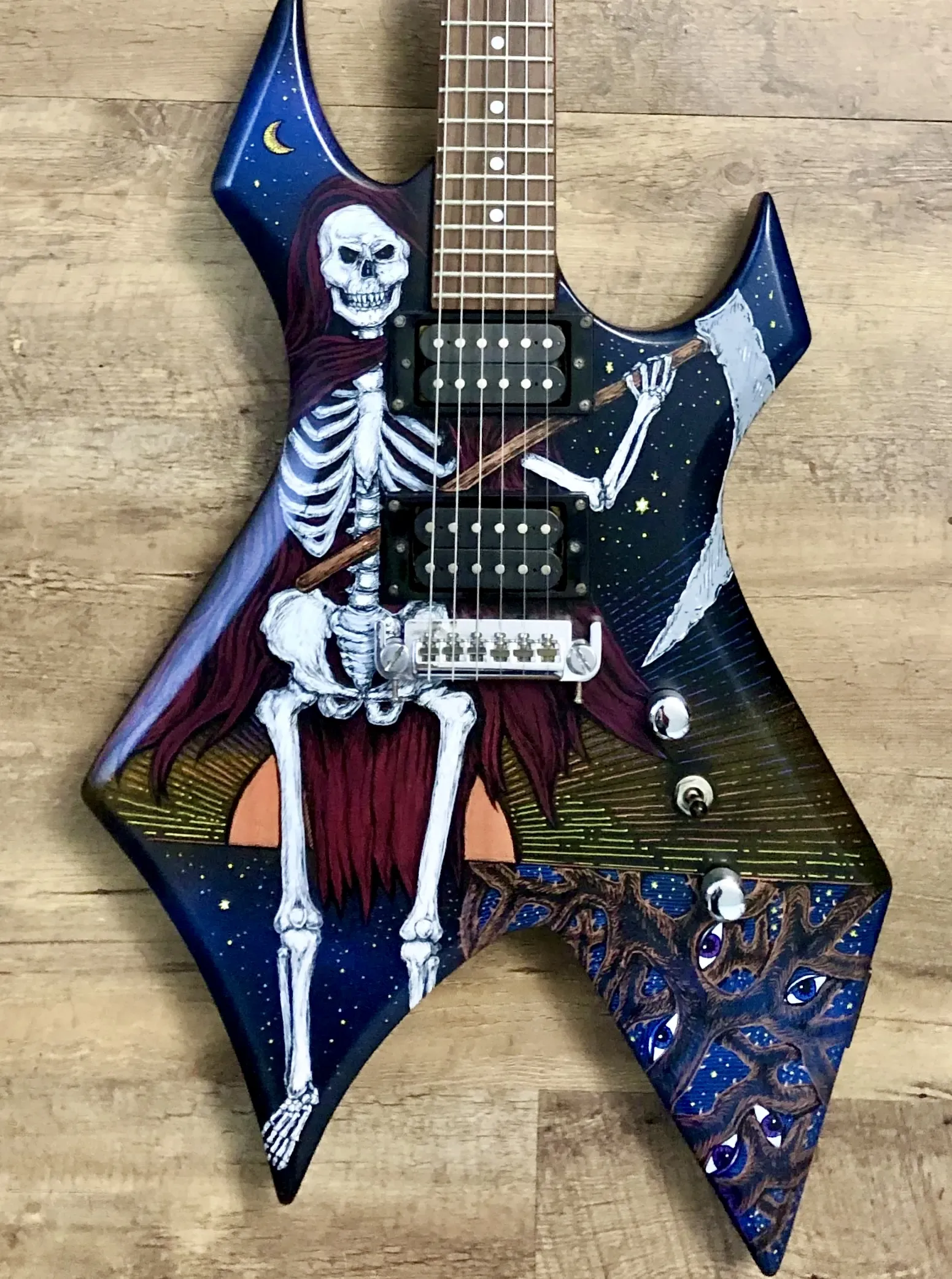 The Watching Woods painted guitar