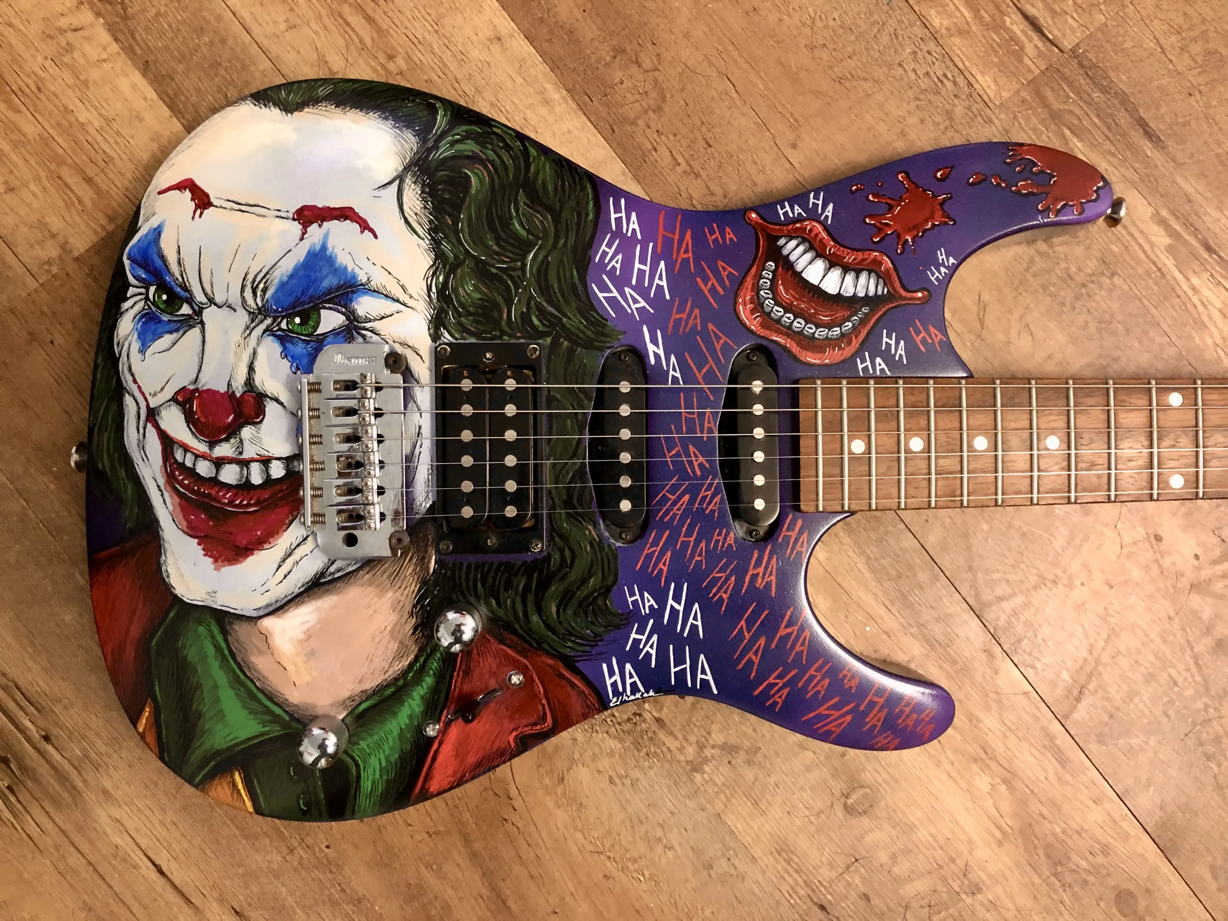 The Joker painted guitar