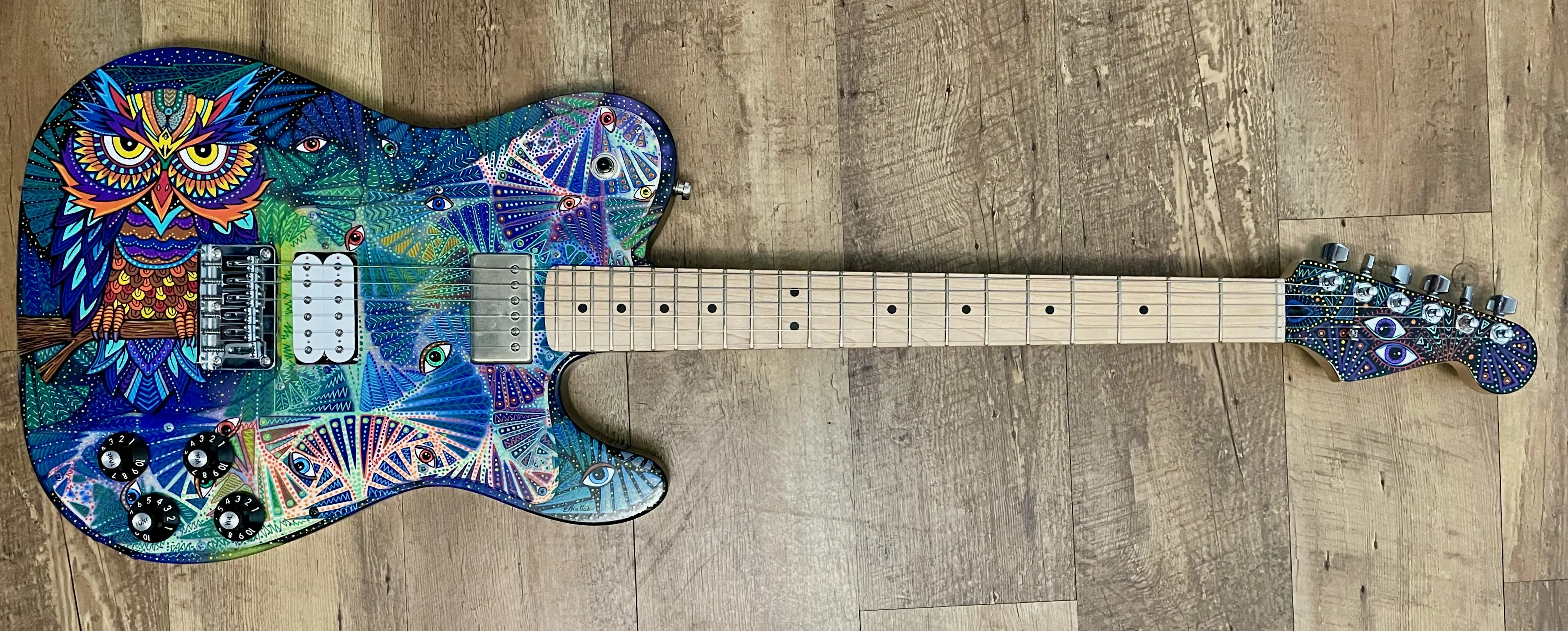 Ronnie Wood with custom painted guitar